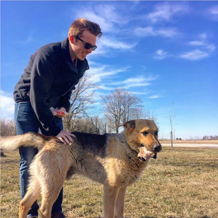 James with a dog